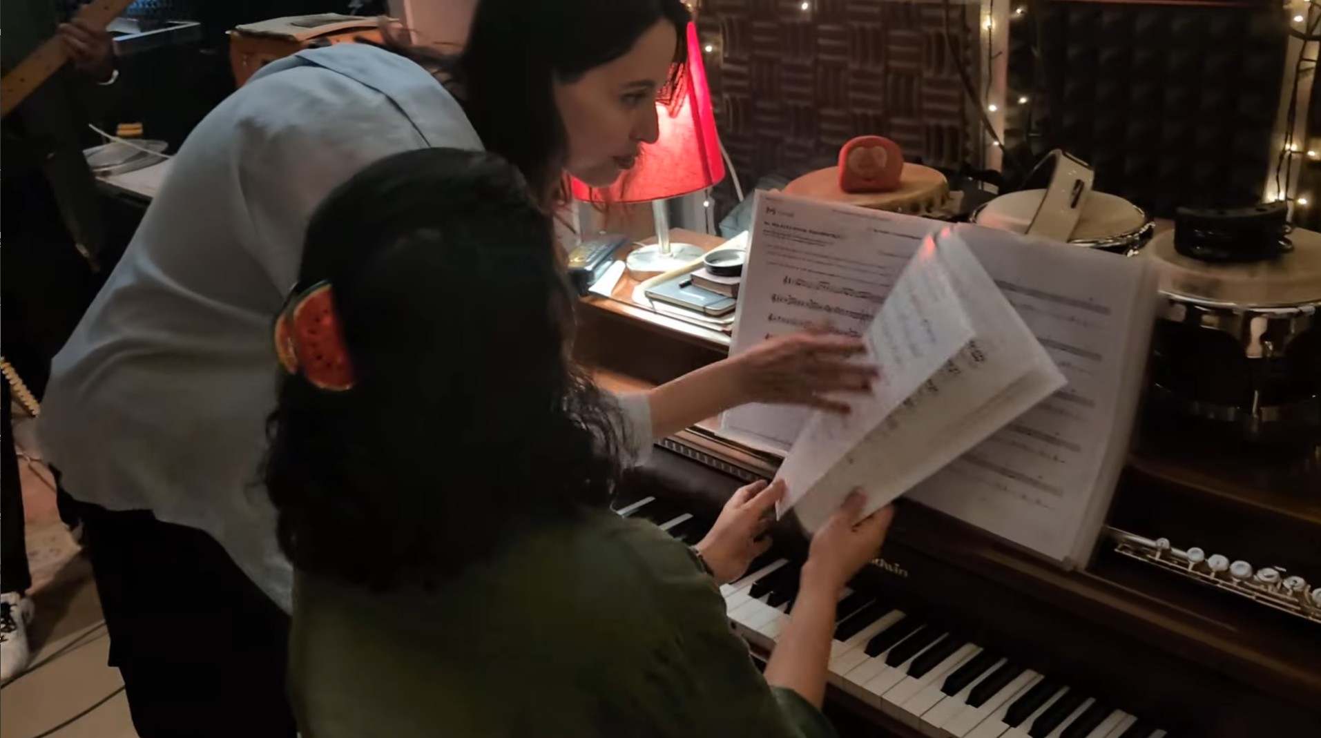 Reading sheet music at the piano
