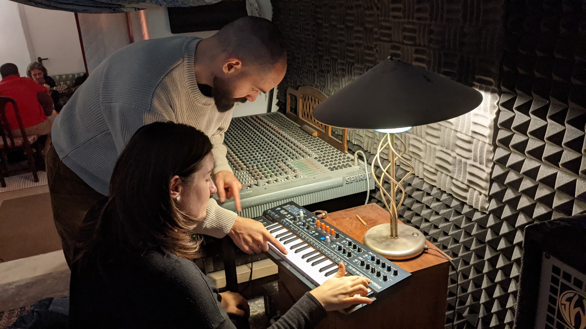 Musicians at the mixing desk
